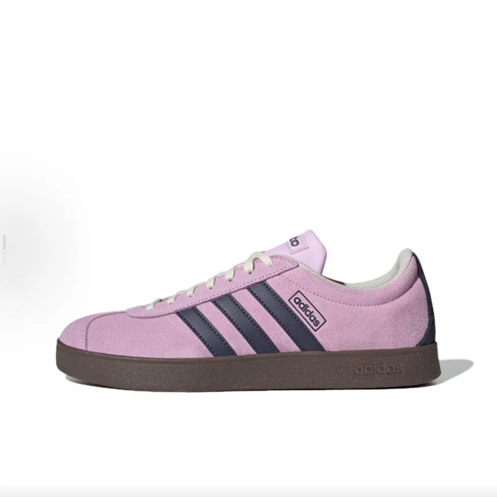 Pink Retro Low Top Sneakers with three blue stripes on a white background