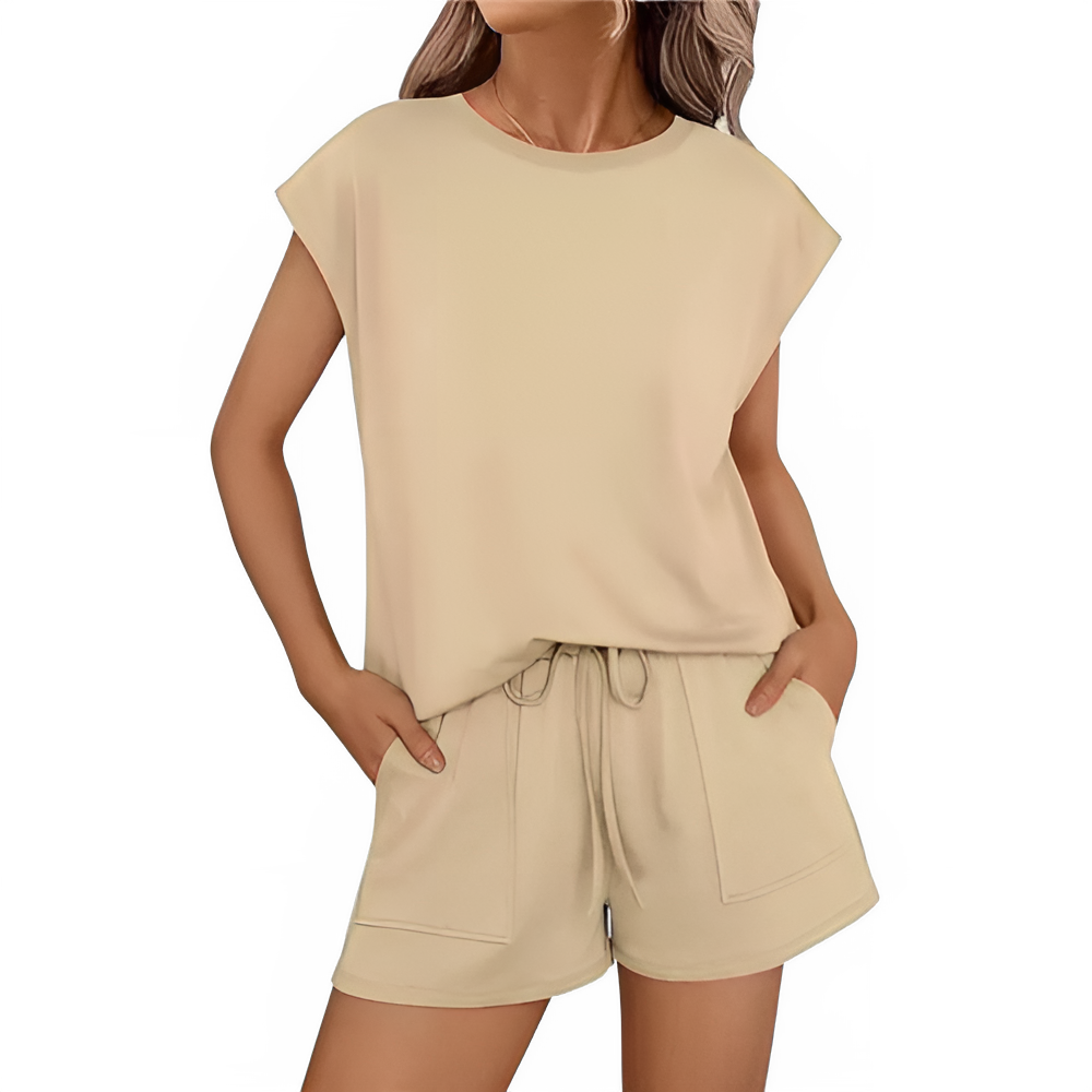 Beige outfit with top and shorts on a white background