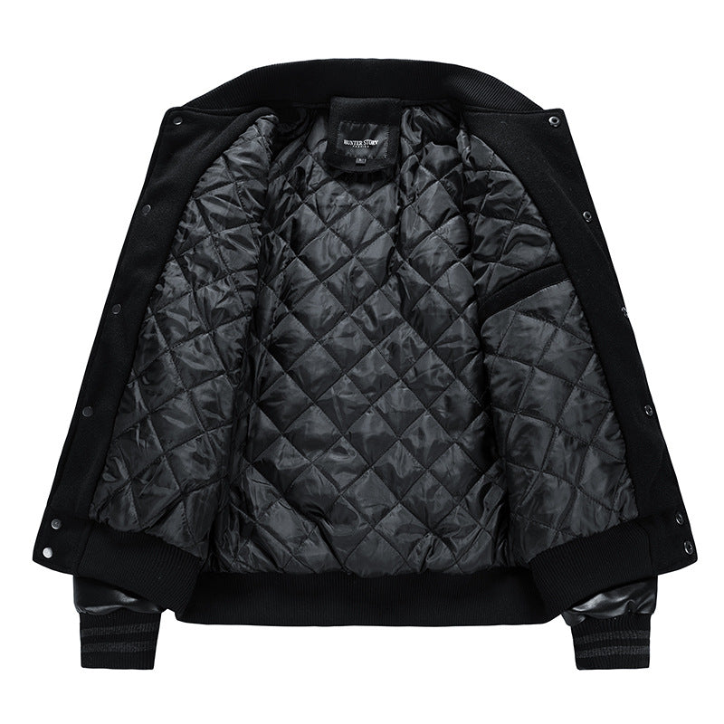 Black quilted jacket on a white background