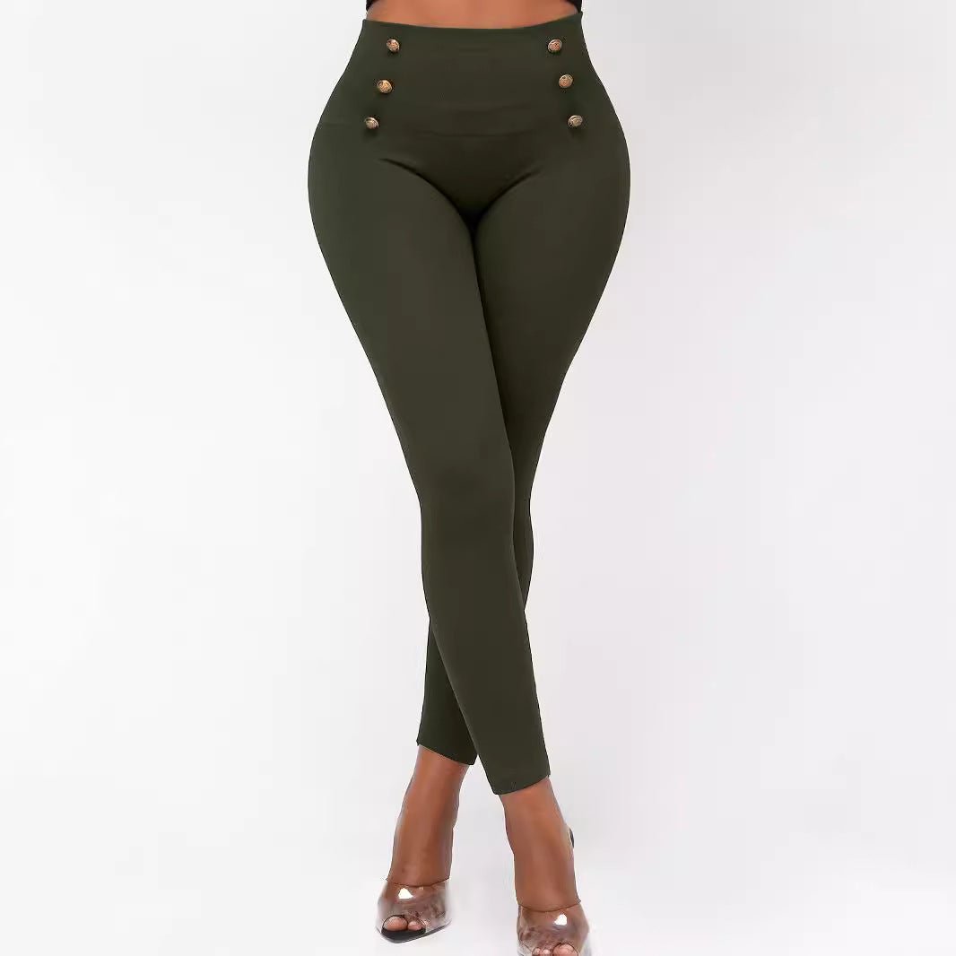 Green High Waisted Pants for Women with button details on a white background