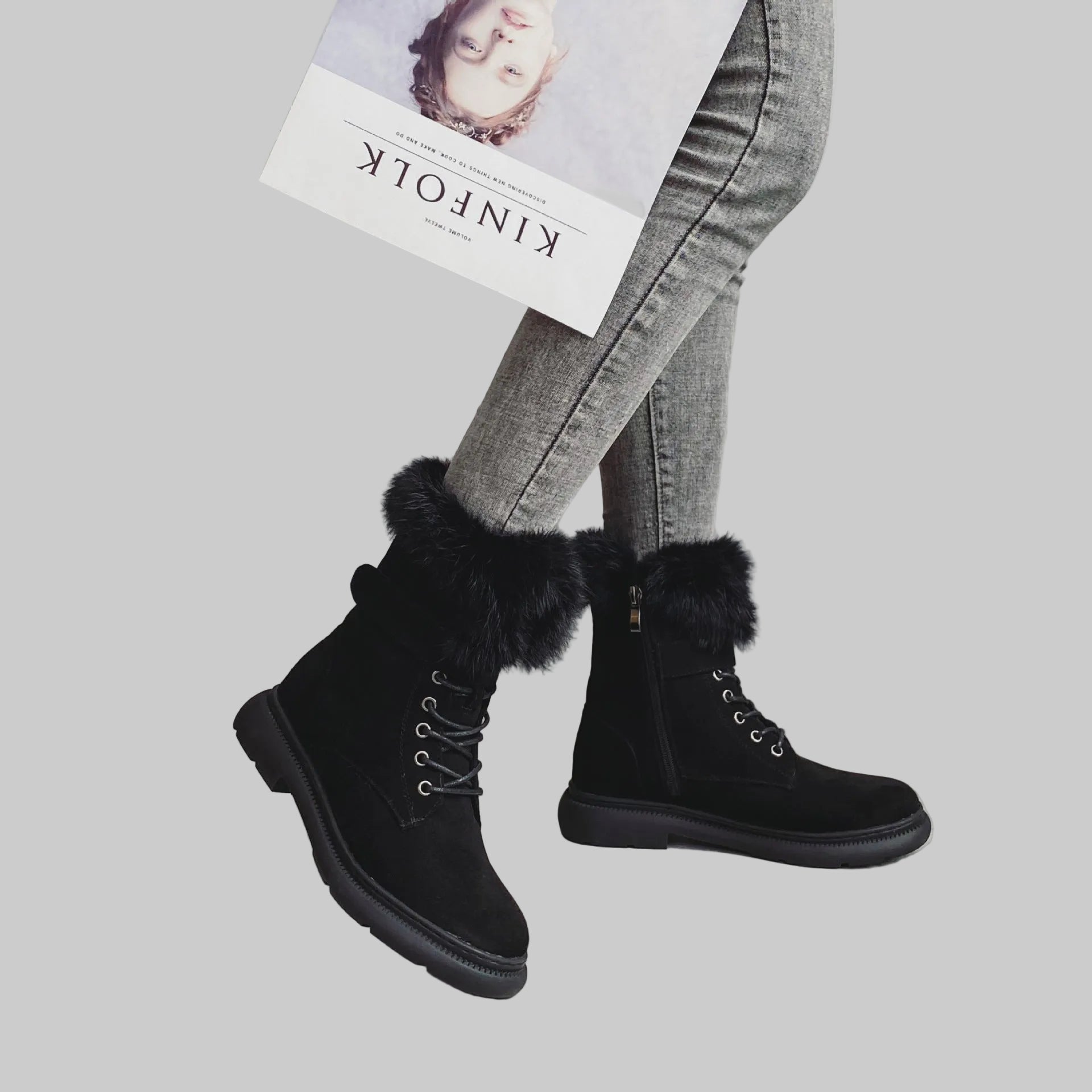 Women wearing faux fur winter platform boots with lace-up front, casual cold-weather outfit.