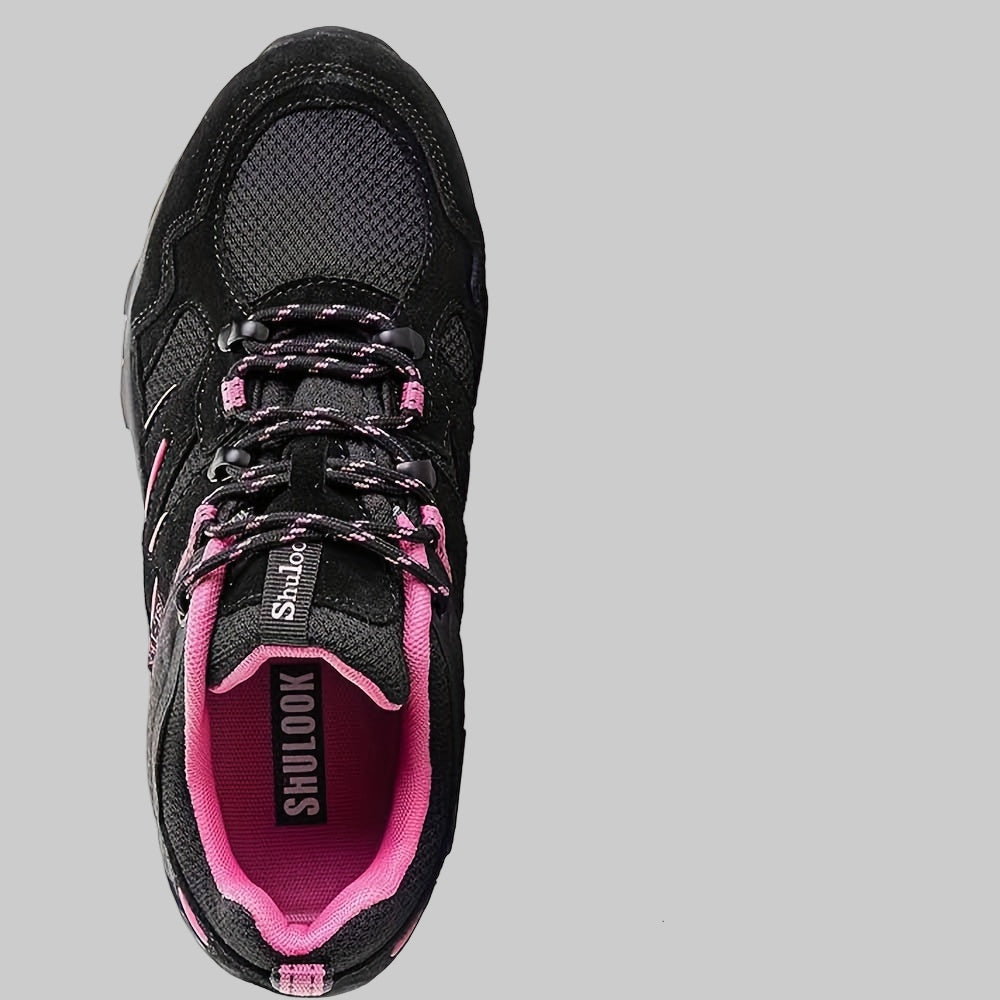 Black and pink women’s non-slip hiking shoes with features highlighted on a white background
